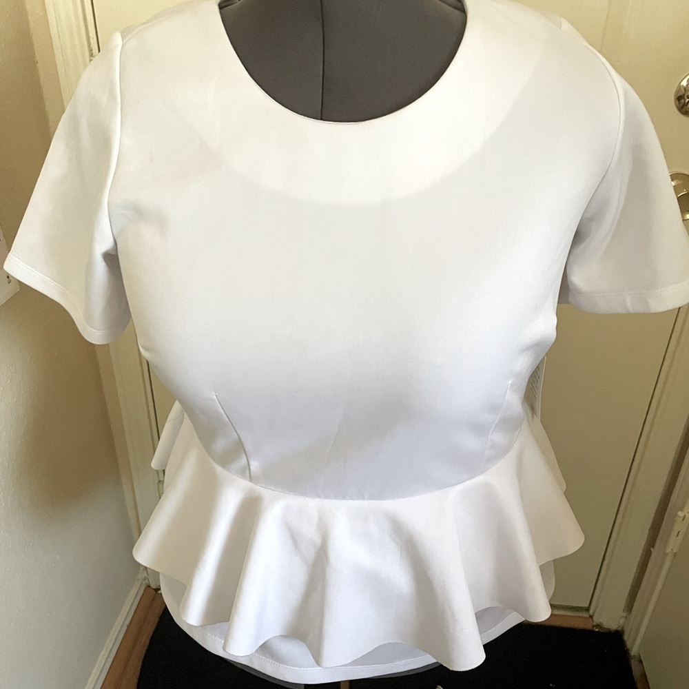 Eloquii white peplum top